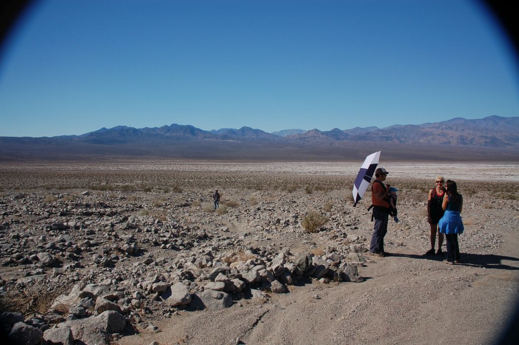 Using the umbrella once again on this hike to keep the sun off of Stefan: